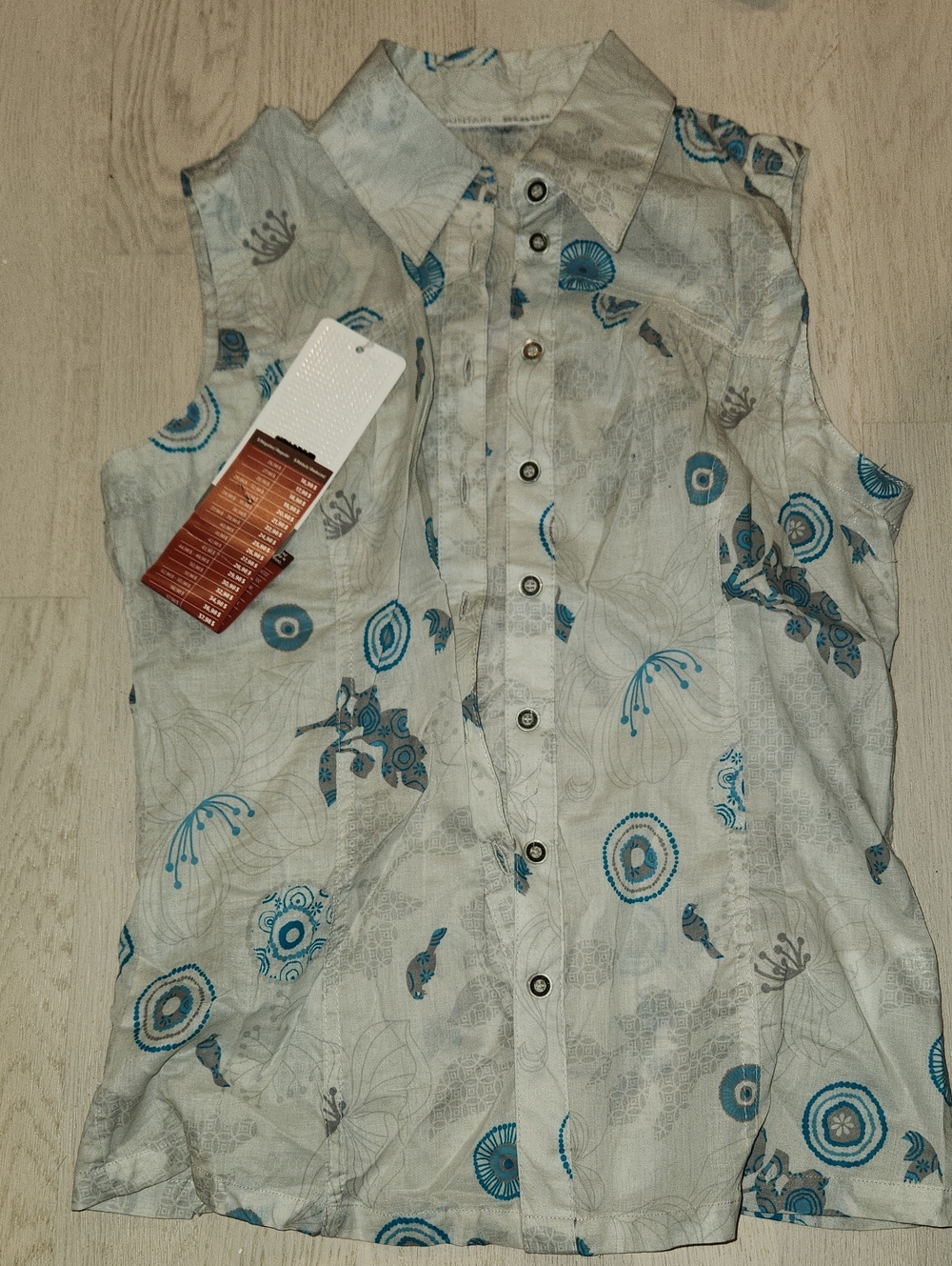 Sleeveless Button-Up Blouse